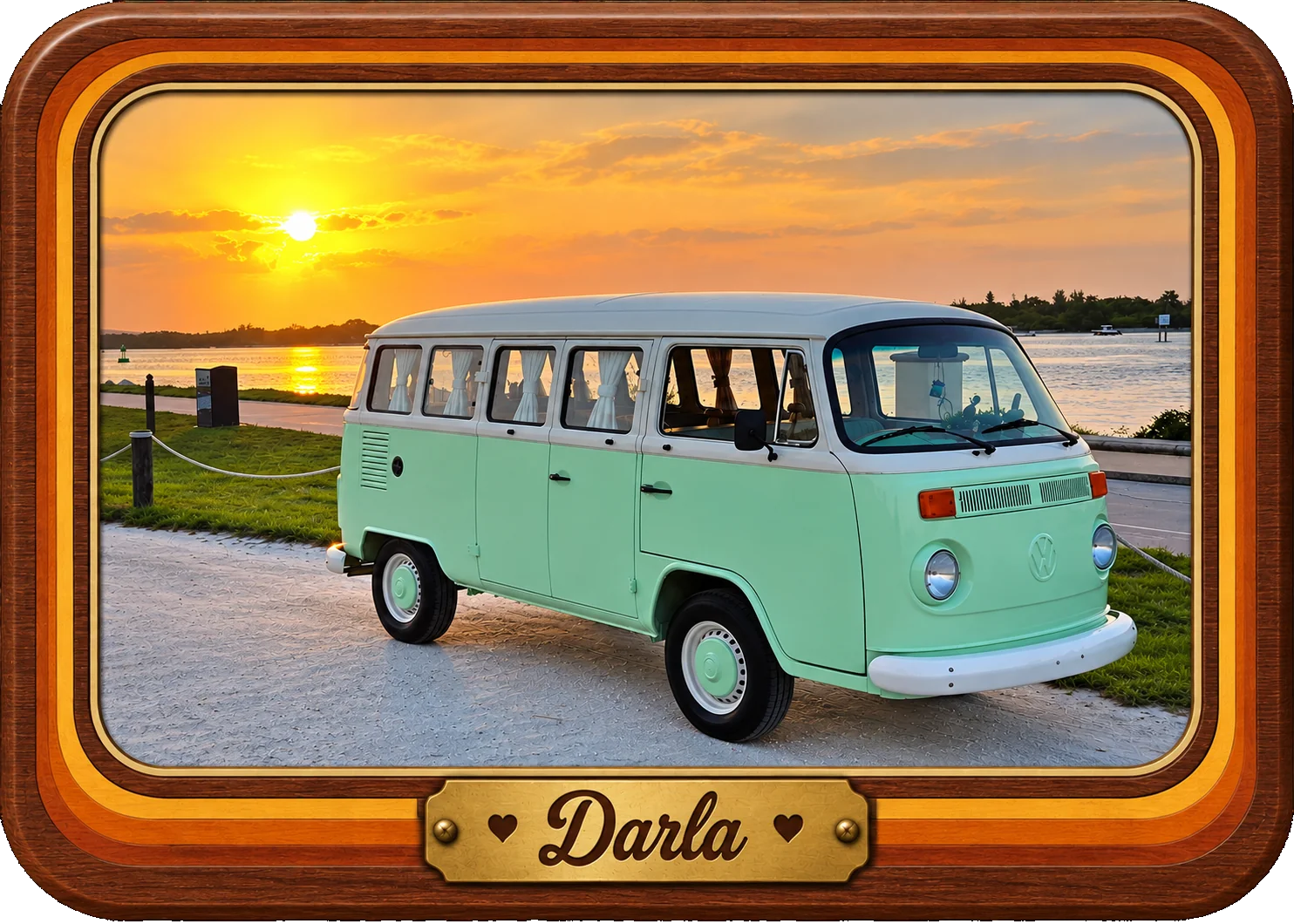 Framed vintage photo of Darla the VW bus at sunset, with a wood-grain frame and brass Darla nameplate
