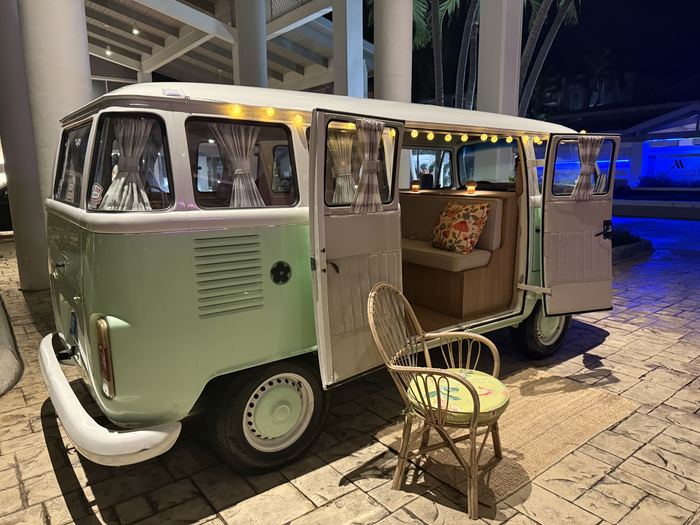 Nighttime interior of Darla the VW bus with string lights