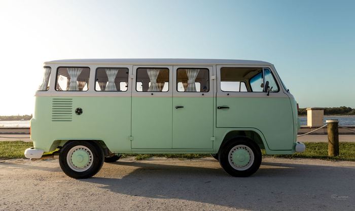 Side profile of Darla the VW bus by the water